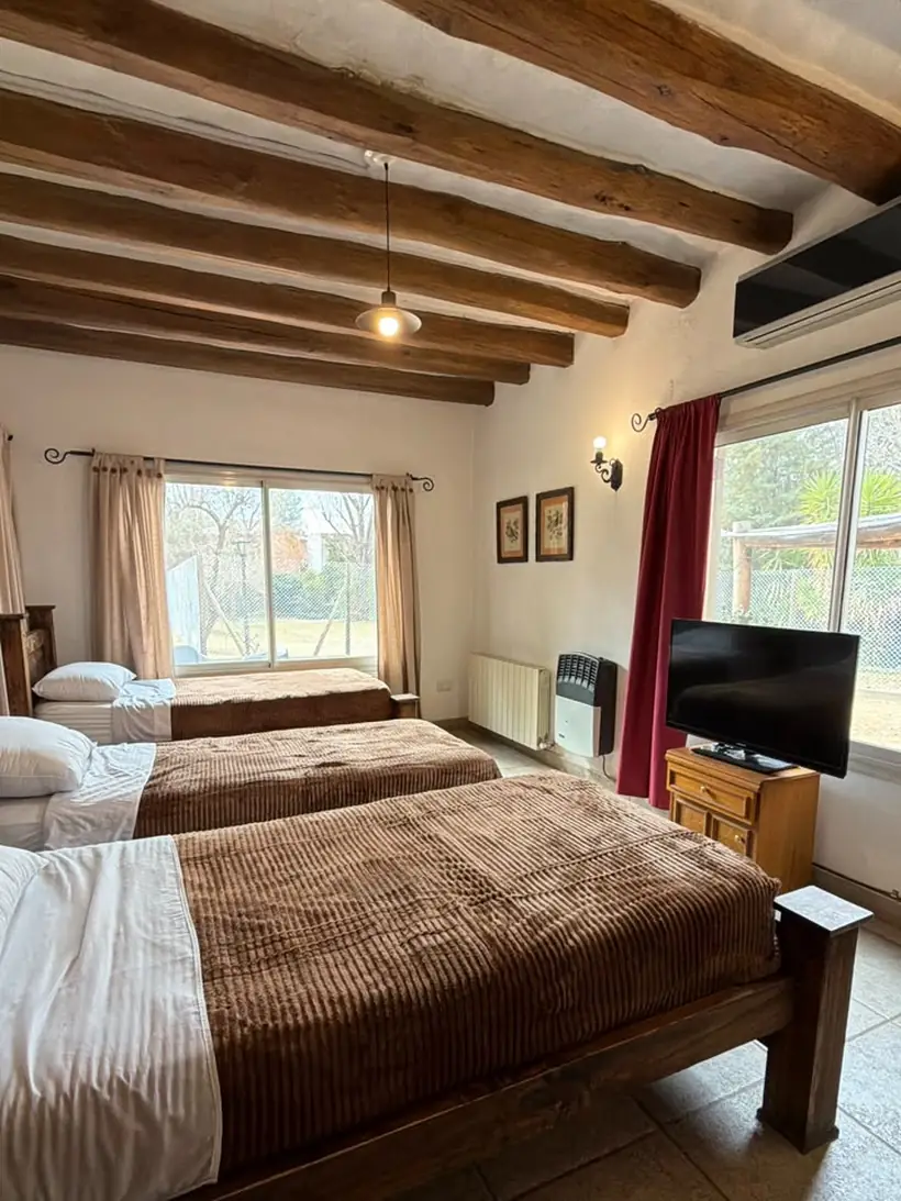 Habitación bajo techo de vigas